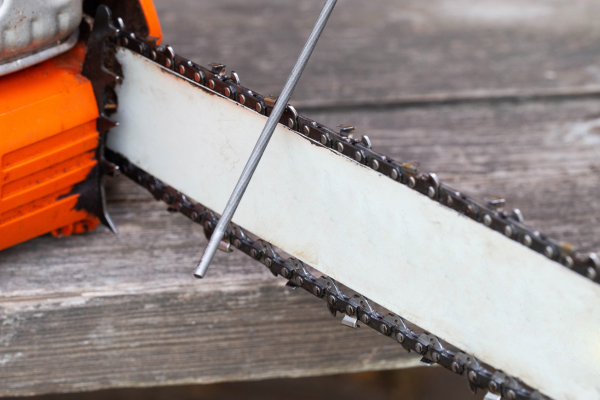 Chainsaw chain being sharpened 